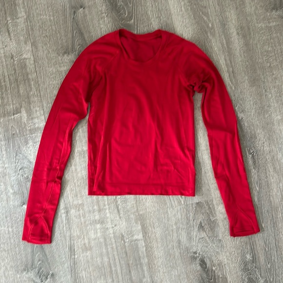 lululemon athletica Tops - Lululemon Red Long Sleeve with thumb holes - size 4